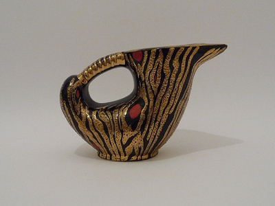 Nr. 1874
Another nice piece of 50s design

Black pitcher with golden lines and red dots

[b]Boch Keralux[/b]

Model 2017, decor Twist or Granada ?

Design Ernest D'hossche

Good vintage condition, no damage

H 16 cm x W 25 cm X D 11 cm

50 euro

[url=https://kosai.be/gallery/contact.php?referer=index.php][img]https://kosai.be/gallery/varia/buy.jpg[/img][/url]


[img]https://www.kosai.be/images/1874.jpg[/img]


[img]https://www.kosai.be/images/1874_4.jpg[/img]


[img]https://www.kosai.be/images/1874_5.jpg[/img]


[img]https://www.kosai.be/images/1874_6.jpg[/img]


[img]https://www.kosai.be/images/1874_7.jpg[/img]


[img]https://www.kosai.be/images/1874_8.jpg[/img]


[url=https://kosai.be/gallery/contact.php?referer=index.php][img]https://kosai.be/gallery/varia/buy.jpg[/img][/url]


[url=https://kosai.be/gallery/displayimage.php?pid=93]Back to top[/url]
Keywords: Boch