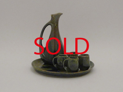 Nr. 1738
Beautiful handmade liquor set 

Blue green waved lava glaze effect

[b]Denbac[/b]

Model 4/IV (pitcher)
Model 191 (4 small mugs)

All in good condition, just 1 chip on the bowl

Mugs: H 5 cm x 5 cm (4x)
Pitcher: H 18 cm x W 9,5 cm
Plate: H 2 cm x W 20 cm

[url=https://kosai.be/gallery/contact.php?referer=index.php][img]https://kosai.be/gallery/varia/buy.jpg[/img][/url]


[img]https://www.kosai.be/images/1738.jpg[/img]


[img]https://www.kosai.be/images/1738_4.jpg[/img]


[img]https://www.kosai.be/images/1738_5.jpg[/img]


[img]https://www.kosai.be/images/1738_7.jpg[/img]


[img]https://www.kosai.be/images/1738_9lr.jpg[/img]


[url=https://kosai.be/gallery/contact.php?referer=index.php][img]https://kosai.be/gallery/varia/buy.jpg[/img][/url]


[url=https://kosai.be/gallery/displayimage.php?pid=85]Back to top[/url]
Keywords: Others